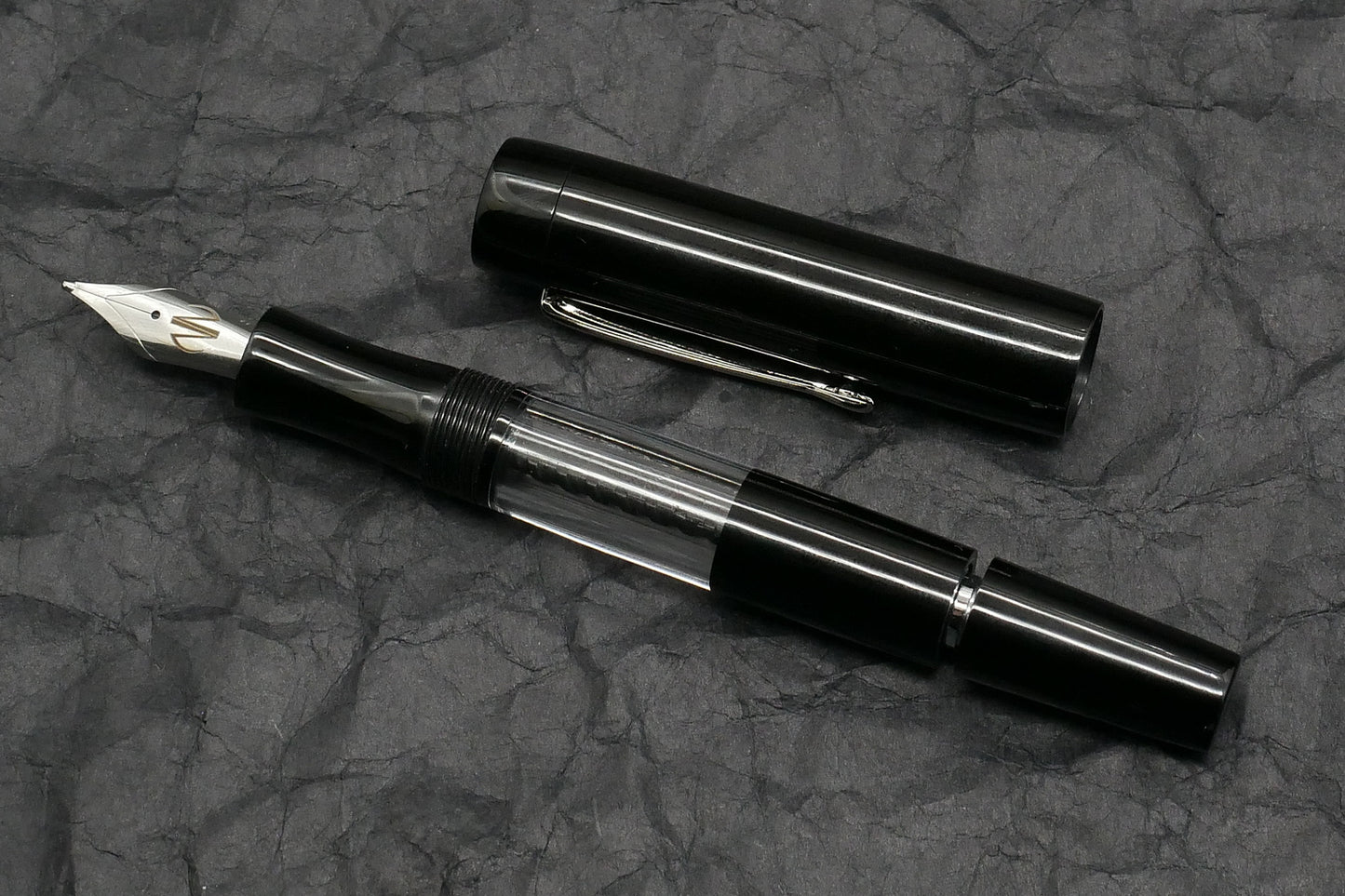 Orville - Medium - Black ebonite, clear acrylic - clip - piston - #6 nib
