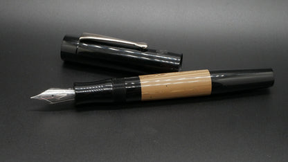 Orville - medium - Black acrylic & NYH White Chocolate ebonite, doublet - clip - Jowo #6 nib