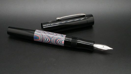 Orville - medium - Black acrylic & Crazy Fiber Blue, doublet - clip - Jowo #6 nib