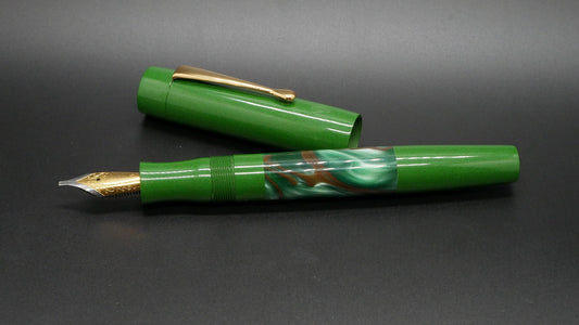 Orville - medium - Nikko Yellow green ebonite and green/brown whirl acrylic, doublet - clip - Jowo #6 nib