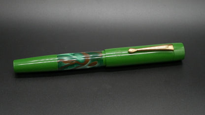 Orville - medium - Nikko Yellow green ebonite and green/brown whirl acrylic, doublet - clip - Jowo #6 nib