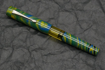 Orville - Medium - Tropical ebonite, yellow acrylic - clip - piston - #6 nib