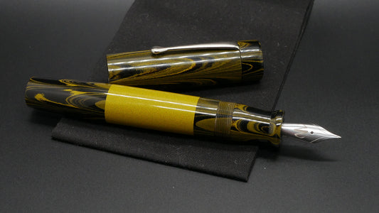 Orville - oversize - Yellow ripple and solid ebonite, doublet - clip - #6 nib